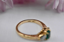Load image into Gallery viewer, 18K Yellow Gold Vintage Oval Cut Emerald and Diamond Three Stone Ring