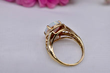 Load image into Gallery viewer, Vintage 10K Yellow Gold Lab Grown Oval Cut Opal & Diamond Halo Ring