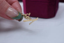Load image into Gallery viewer, Vintage 14k Yellow Gold Movable Animated Skiing Charm