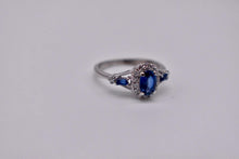 Load image into Gallery viewer, Vintage 10K White Gold Oval Cut Natural Sapphire and Diamond Halo Ring