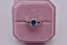 Load image into Gallery viewer, Vintage 10K White Gold Oval Cut Natural Sapphire and Diamond Halo Ring