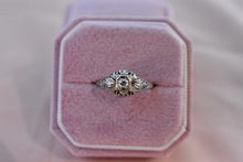 Load image into Gallery viewer, 18K White Gold Art Deco Transitional Cut Diamond Three Stone Filigree Belais Engagement Ring