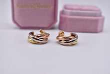 Load image into Gallery viewer, Vintage Pre Loved Cartier 18k Yellow Rose and White Gold Classic Interlocking Trinity Hoop Earrings