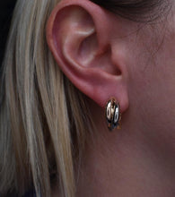 Load image into Gallery viewer, Vintage Pre Loved Cartier 18k Yellow Rose and White Gold Classic Interlocking Trinity Hoop Earrings