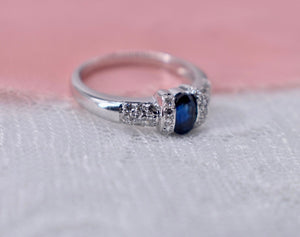 Vintage 18K White Gold Unique Oval Cut Sapphire and Diamond Ring