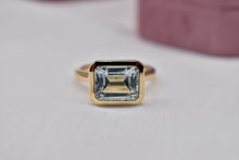 Load image into Gallery viewer, Reserved Listing Custom Made 14 Karat Full Bezel Emerald Cut East West Aquamarine Ring
