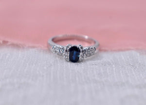 Vintage 18K White Gold Unique Oval Cut Sapphire and Diamond Ring