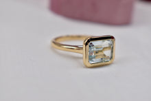 Load image into Gallery viewer, Reserved Listing Custom Made 14 Karat Full Bezel Emerald Cut East West Aquamarine Ring
