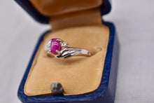 Load image into Gallery viewer, Vintage 10K White Gold Oval Pink Star Sapphire &amp; Diamond Bypass Style Ring
