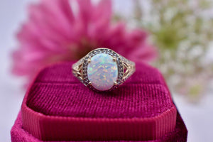 Vintage 10K Yellow Gold Lab Grown Oval Cut Opal & Diamond Halo Ring
