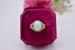 Vintage 10K Yellow Gold Lab Grown Oval Cut Opal & Diamond Halo Ring