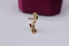 Load image into Gallery viewer, Vintage 14k Yellow Gold Movable Animated Skiing Charm
