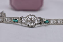 Load image into Gallery viewer, Vintage Art Deco 14K White Gold Filigree Bracelet, Transitional Cut Diamond, Emerald Glass
