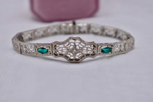 Load image into Gallery viewer, Vintage Art Deco 14K White Gold Filigree Bracelet, Transitional Cut Diamond, Emerald Glass
