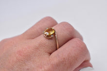 Load image into Gallery viewer, Vintage 10K Yellow Gold Vintage Lab Grown Yellow Sapphire &amp; Diamond Accented Bypass Style Ring
