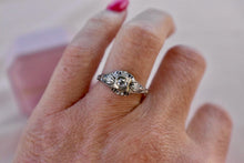 Load image into Gallery viewer, 18K White Gold Art Deco Transitional Cut Diamond Three Stone Filigree Belais Engagement Ring

