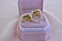Load image into Gallery viewer, Vintage 14K Yellow Gold Channel Set Emerald &amp; Diamond Criss Cross Omega Earrings
