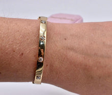 Load image into Gallery viewer, 18K Yellow Gold &amp; Platinum Pre Loved Hearts On Fire Four Stone Diamond Copley Bangle Bracelet
