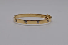 Load image into Gallery viewer, 18K Yellow Gold &amp; Platinum Pre Loved Hearts On Fire Four Stone Diamond Copley Bangle Bracelet
