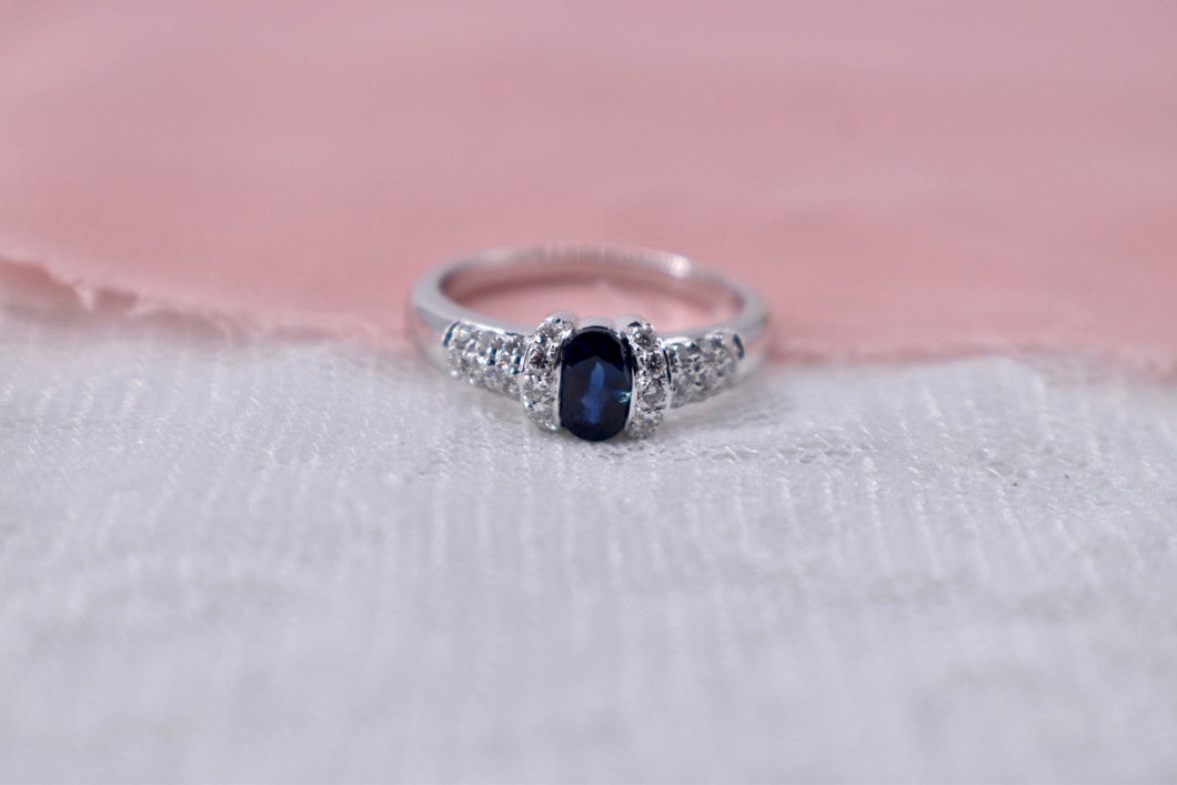 Vintage 18K White Gold Unique Oval Cut Sapphire and Diamond Ring
