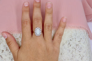 Vintage 14K White Gold Oval Opal and Diamond Halo Ring