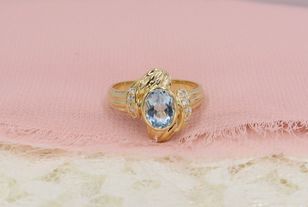 Vintage 14K Yellow Gold Unique Oval Blue Topaz and Diamond Ring