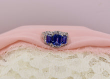 Load image into Gallery viewer, 10K White Gold Imitation Tanzanite and White Cubic Zirconia 3 Stone Halo Ring
